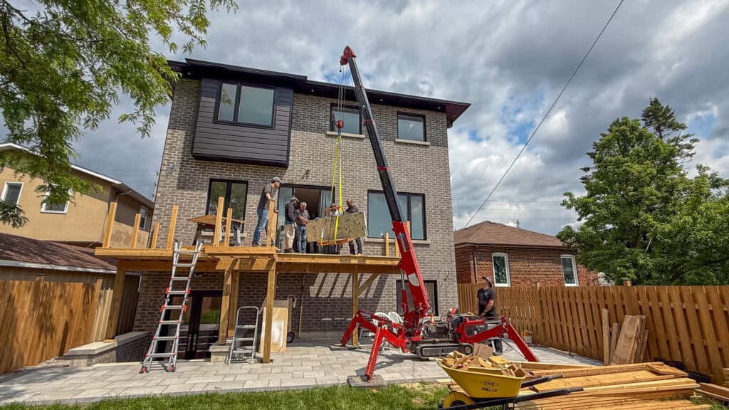 We are using a SpyderCrane to lift heavy counter tops onto balcony.
